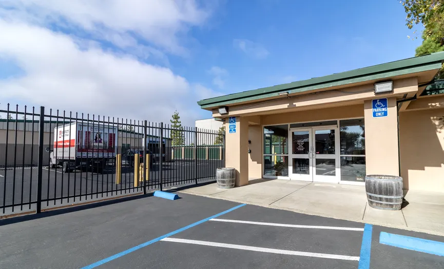 Exterior view of the Security Public Storage main office next to the electronic gate in Napa
