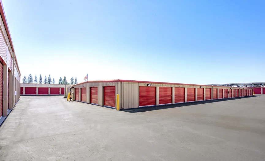 Outdoor drive-up storage units at a secure storage facility in Fairfield near Highway 12