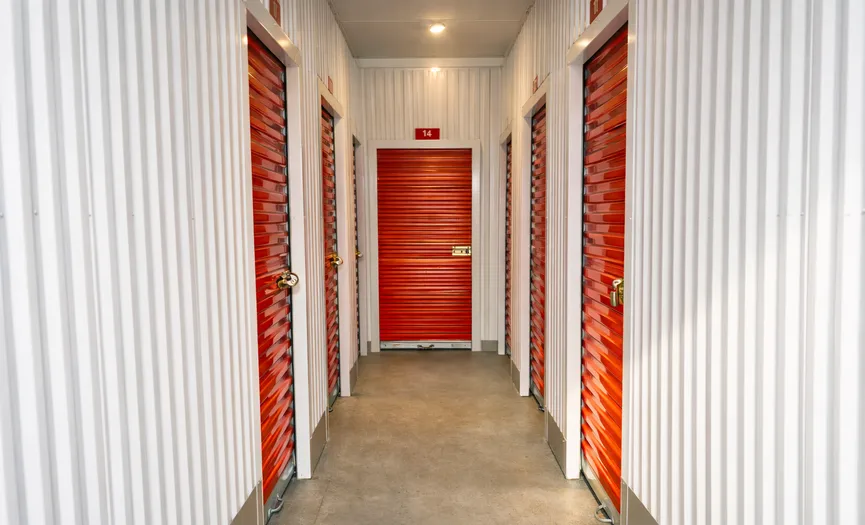 Indoor hallway of secure self storage units at a storage facility in South Hayward