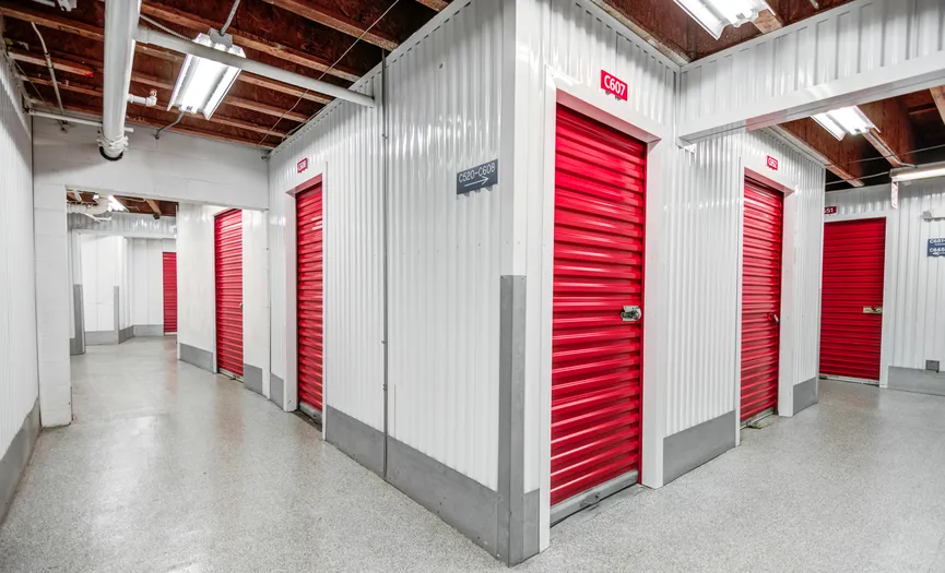 Interior hallway with clean indoor storage units at Security Public Storage in South Oceanside