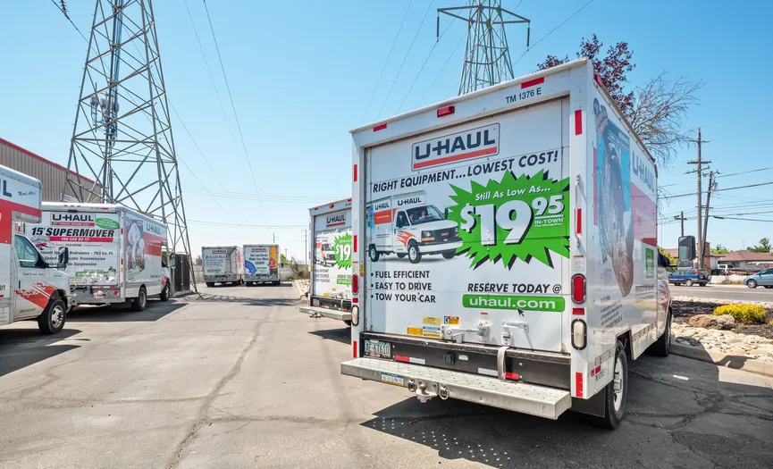 Moving trucks parked outside and available for customers at the Security Public Storage location on Power Inn Rd in Sacramento CA