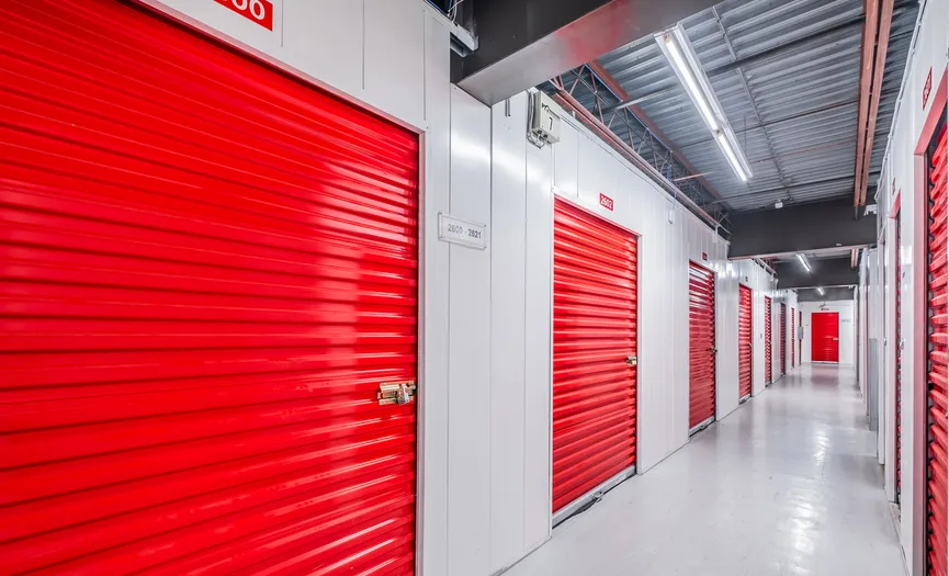 Hallway of individually alarmed indoor storage units at Security Public Storage in San Mateo