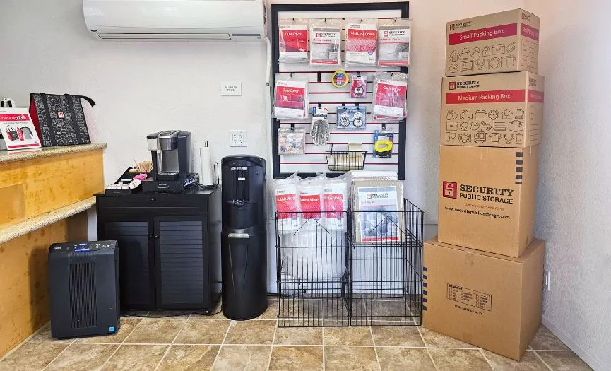 Boxes, locks, and moving supplies for sale inside the main office of a self storage facility in Hayward CA